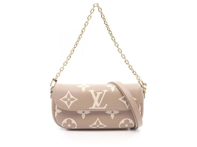 Bolso Louis Vuitton de piel beige