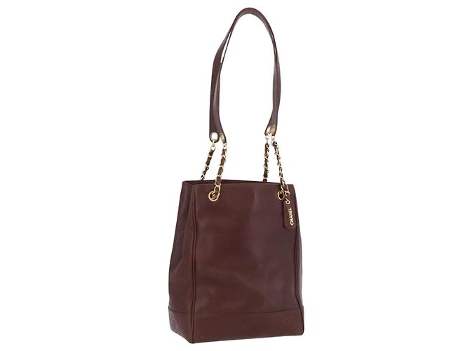 Bolsa de ombro CHANEL em couro caviar marrom e dourado CC