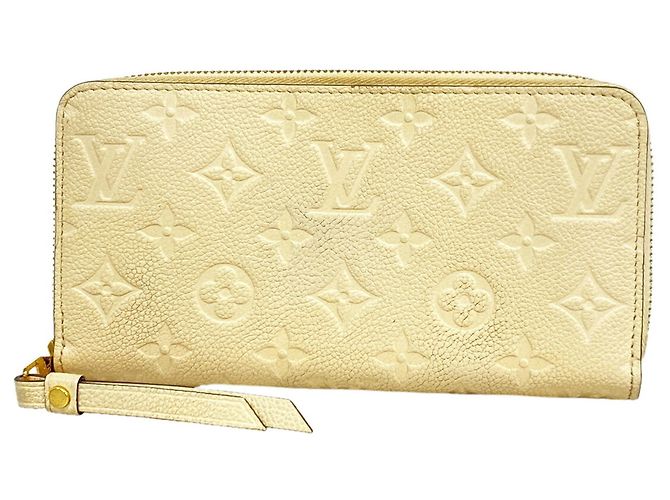 Cartera Zippy Monogram Empreinte Louis Vuitton Crudo
