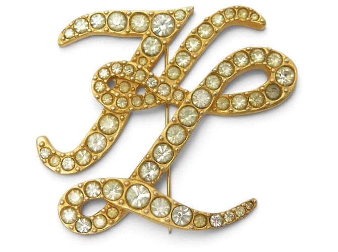 BROCHE VINTAGE KARL LAGERFELD INICIAIS MONOGRAMA KL BANHADO A OURO E STRASS