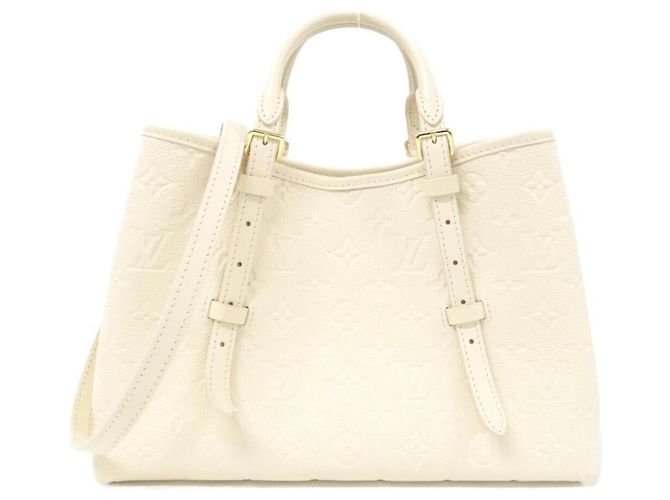 Louis Vuitton Monogram Empreinte Babylon Tote PM Beige