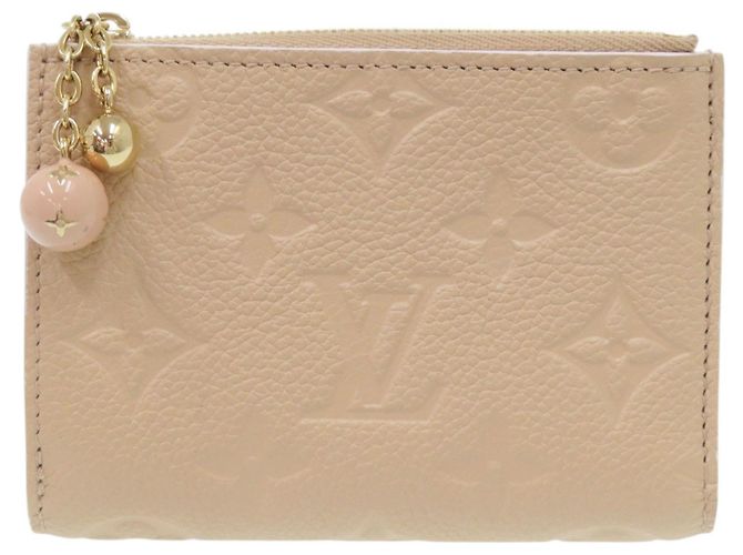 Louis Vuitton Portefeuille Lisa Monogram Empreinte Bi-Fold Wallet Beige