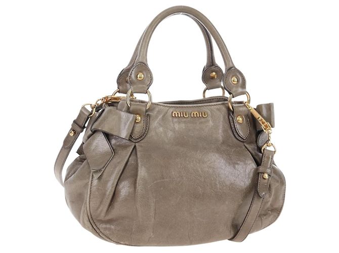 Bolsa Miu Miu Vitellolux em couro 2way marrom tom dourado Auth 208116V