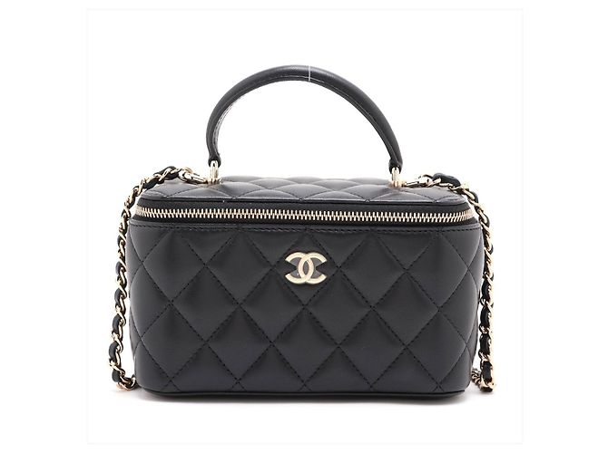 Chanel Vanity Case Pequeño de piel de cordero acolchada con bolso de mano de cadena Negro