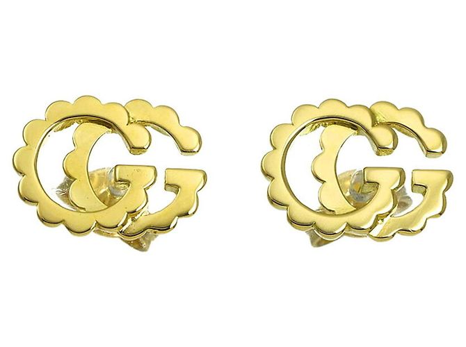 Orecchini Gucci GG Running in oro giallo 18K