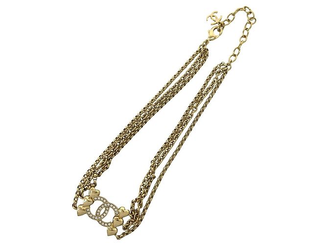 Collier Chanel Coco Mark motif cœur plaqué or et strass
