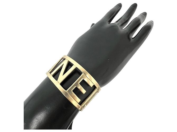 Chanel Gold Plated Logo Bangle Golden