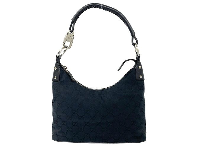 Bolsa de couro e lona com padrão GG Logo Gucci