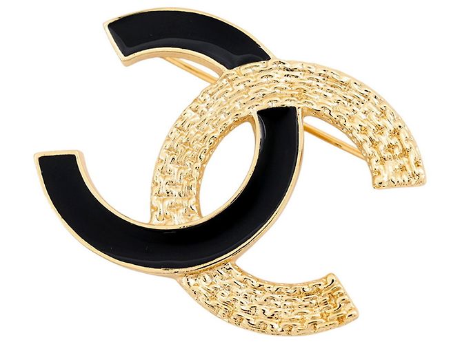 Spilla in smalto nero e oro Chanel D'oro