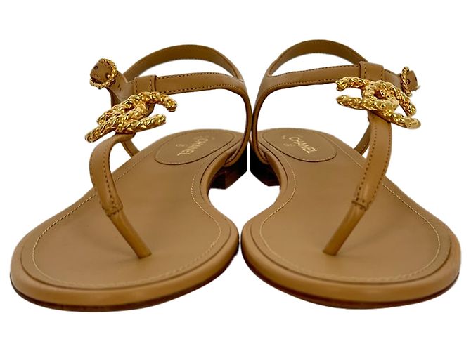 Chanel Logo T-Strap Flat Sandals in Tan Leather