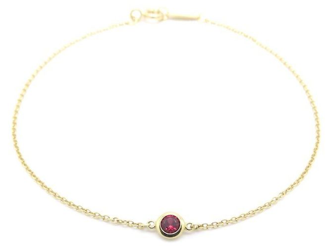 Autre Marque Pulsera de dijes Tiffany & Co. en oro amarillo de 18K