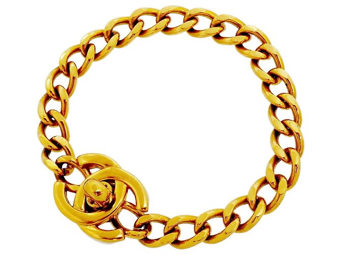 Pulsera con dijes dorada Chanel