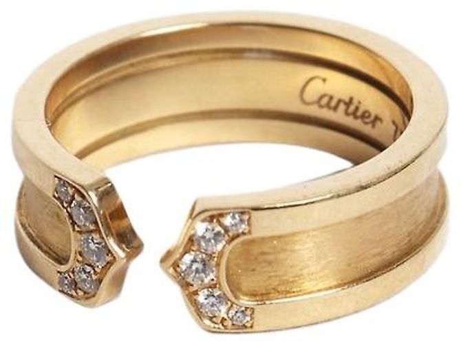 Anillo C de Cartier en oro 18k