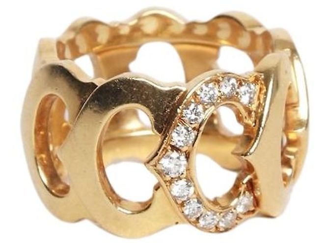 Anillo C de Cartier en oro 18k