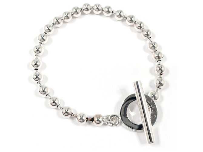 Pulsera con dijes GUCCI en Plata 925