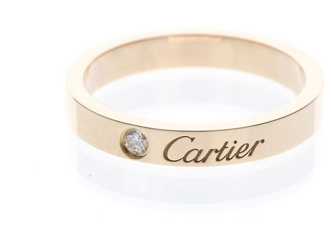 Anillo de bodas C de Cartier en oro rosa