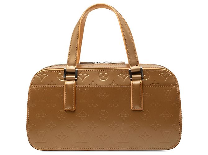 Louis Vuitton Gold Monogram Mat Shelton