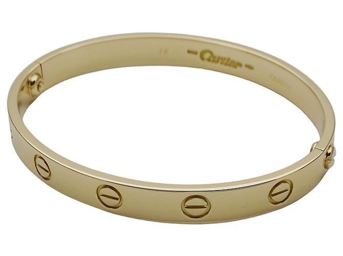 Bracciale con charm Cartier in oro giallo