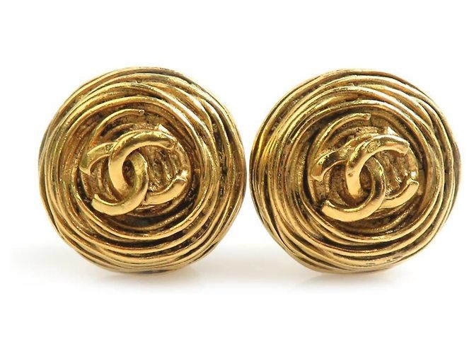 Boucles d'oreilles clips Chanel en métal doré