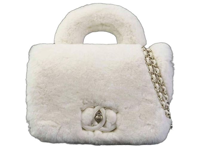 Bolsa de mão Chanel em couro e pele Off-White