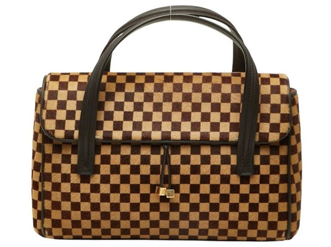Bolsa Louis Vuitton Damier Sauvage Lion Dice