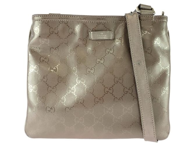 Bolsa de Ombro Pochette Gucci GG Estampada