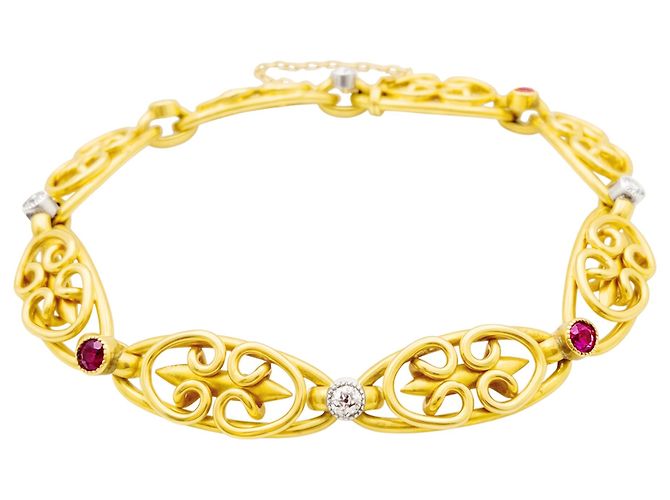Autre Marque Pulseira do início do século XX em ouro amarelo, rubis e diamantes.