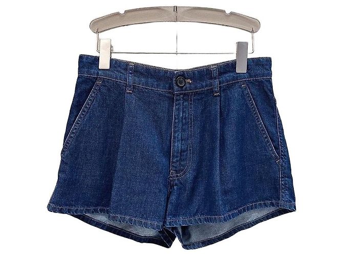 Shorts Miu Miu de denim azul con estampado de logo