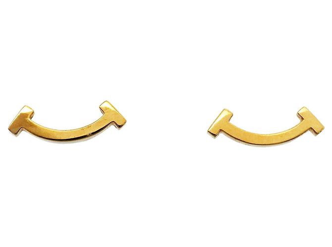 Autre Marque Pendientes Tiffany & Co. T Smile Mini en oro amarillo de 18K