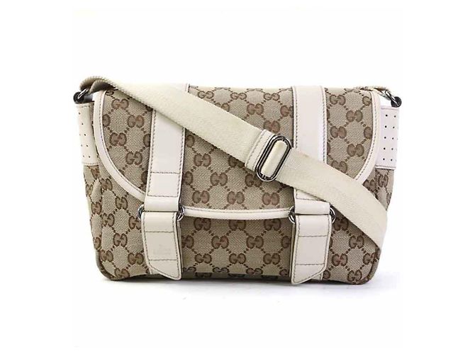Bolsa de Ombro Gucci em Lona GG e Couro