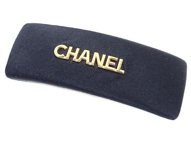 Fermi capelli Chanel in pelle e raso nero