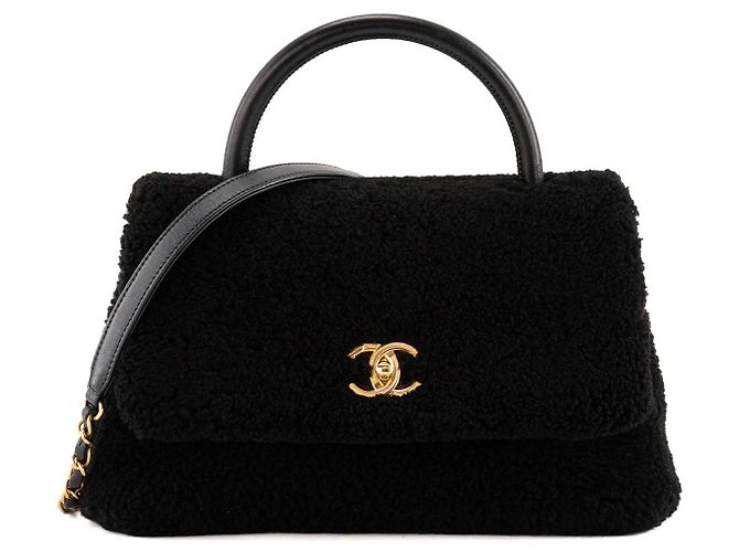 CHANEL - Borsa a tracolla Coco Handle Chanel in shearling e pelle nera