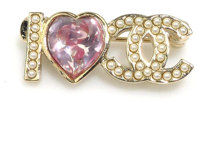 Broche Chanel Dourada e Rosa