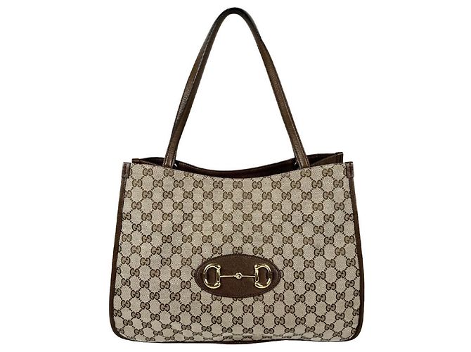 Bolsa de mão Gucci marrom em GG Canvas e couro