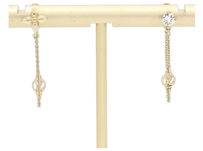 Pendientes de botón en metal dorado Louis Vuitton