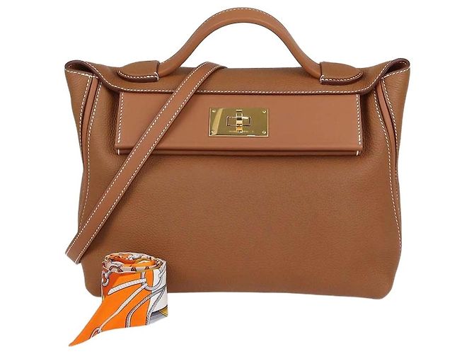 Hermès Bolsa Hermes 24/24 29 em couro Togo e Swift Gold com Twilly