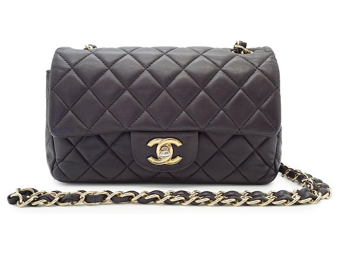 Chanel Mini bolsa de ombro em couro de cordeiro matelassé com aba única e corrente