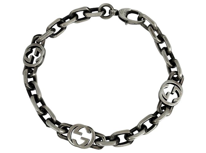 Bracciale con ciondolo Interlocking G in argento Gucci