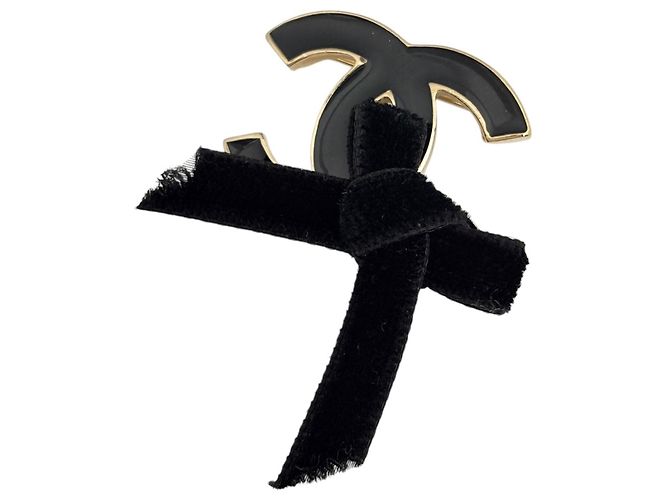 Spilla Chanel placcata oro nero