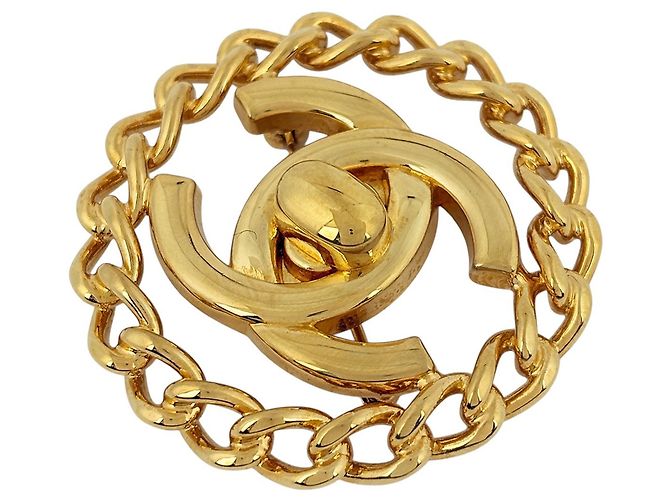 Chanel vergoldete Brosche mit Coco-Logo