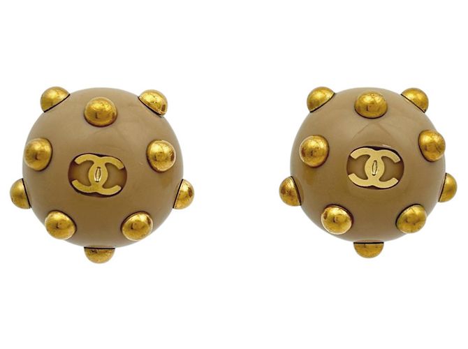 Orecchini a clip Chanel Coco Mark beige e oro