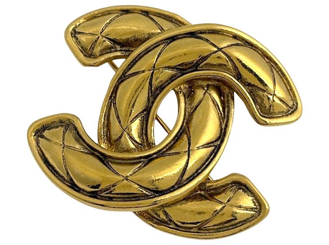 Spilla Chanel placcata oro