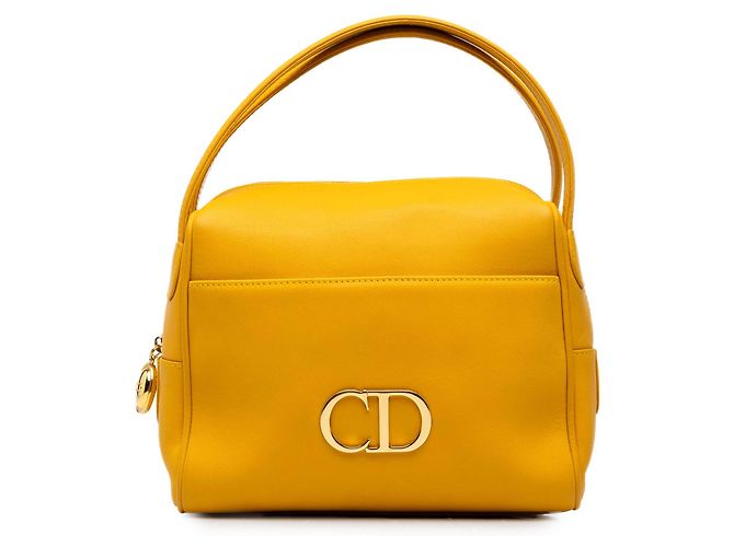 Bolsa Dior em couro amarelo com logo CD