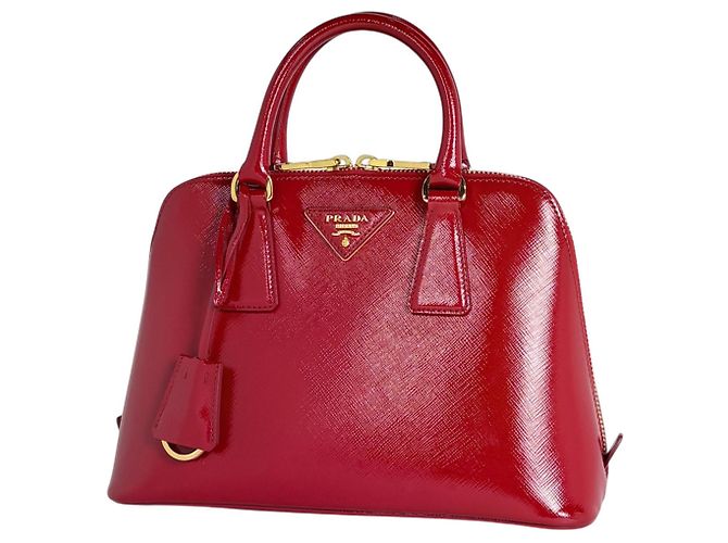 Bolsa de mão Prada em couro vermelho