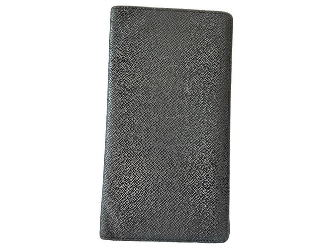 Louis Vuitton Brazza Wallet in Black Taiga Leather