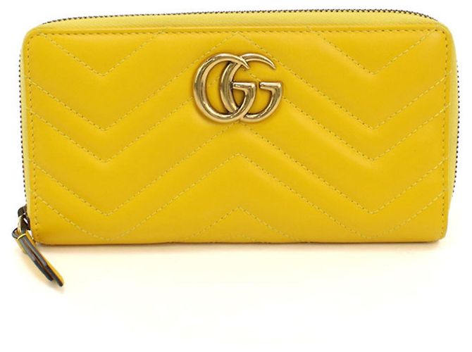 Cartera larga Gucci de piel amarilla