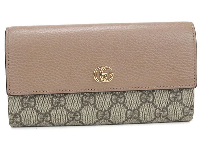 Cartera larga bi-fold Gucci en Beige