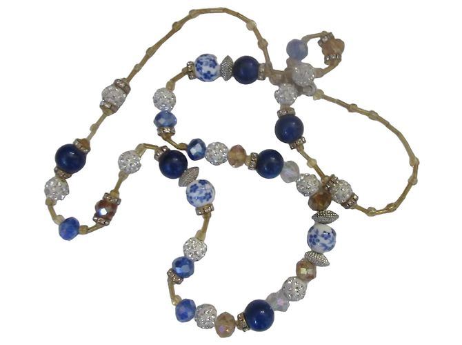 Autre Marque Collier de perles bleu et blanc avec détails dorés