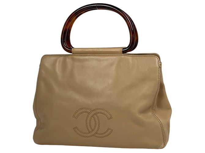 Sac à main Chanel en cuir beige