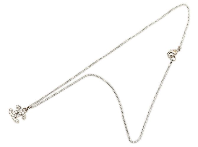 Collana con pendente Chanel CC in ottone e strass argento